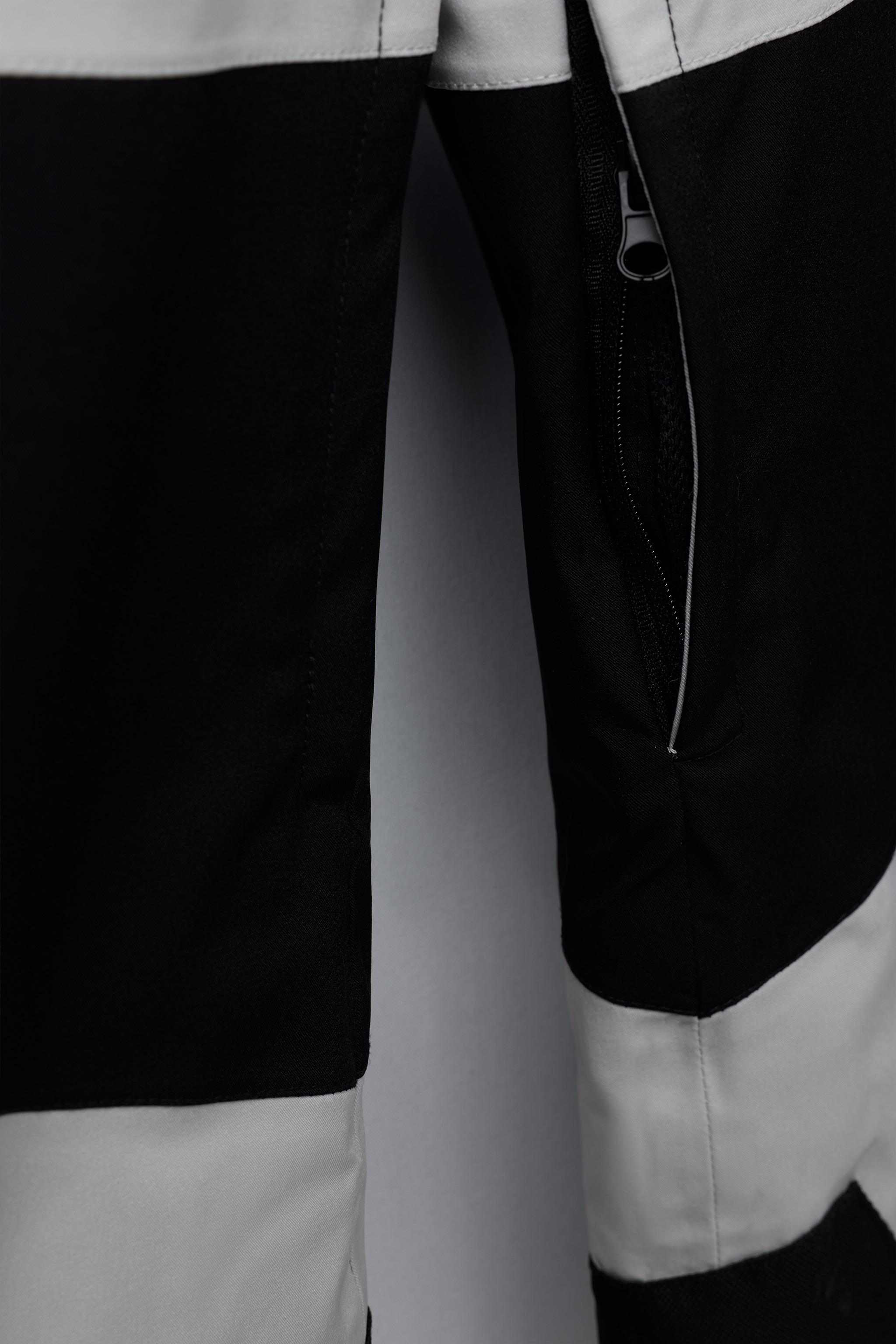 WINDPROOF AND WATER RESISTANT RECCO® SYSTEM SKI COLLECTION JUMPSUIT